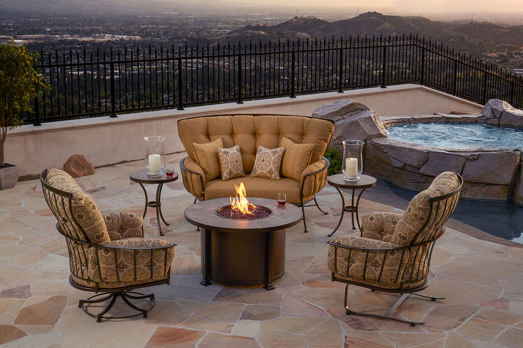 Monterra lounge collection with fire pit on tile patio overlooking the city