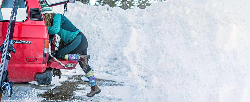 skier getting gear out of trunk