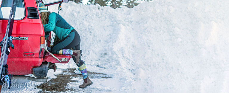 skier getting gear out of trunk