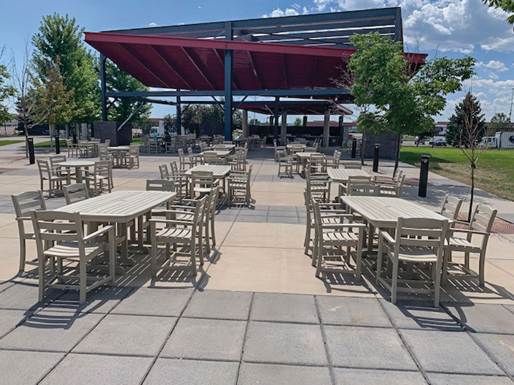 commercial outdoor dining furniture in a corporate setting