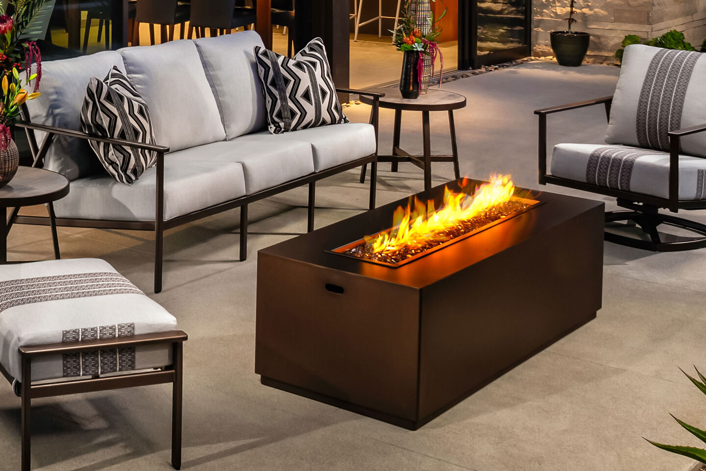 Rectangular fire pit with lounge furniture