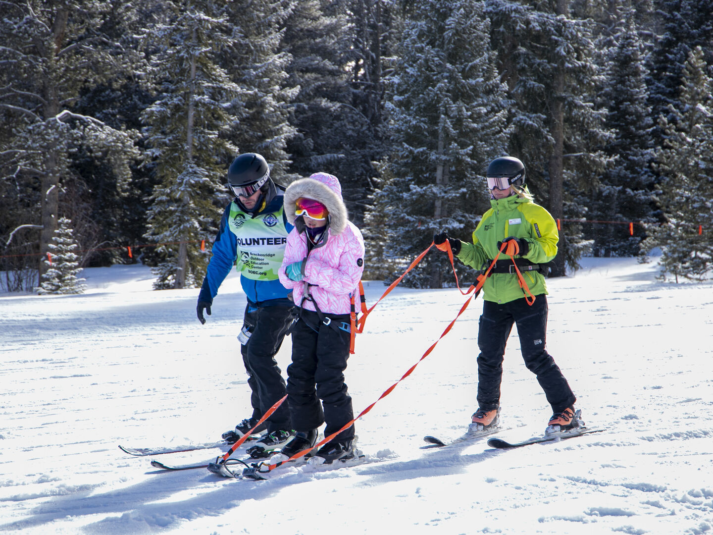 Ellie with her ski instructor 