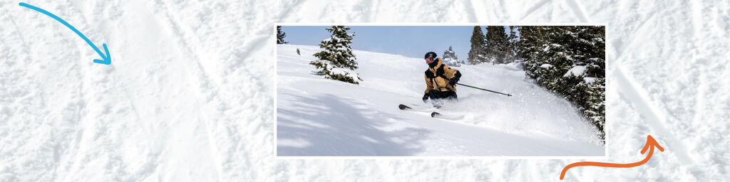 Skier in pow on a sunny day
