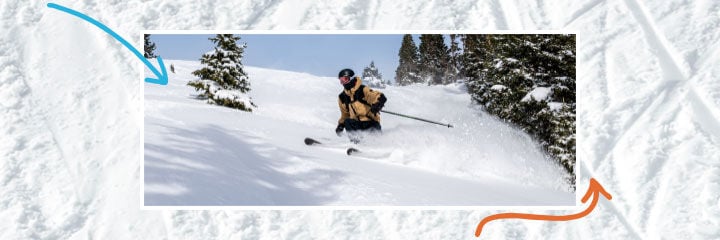 Skier in pow on a sunny day