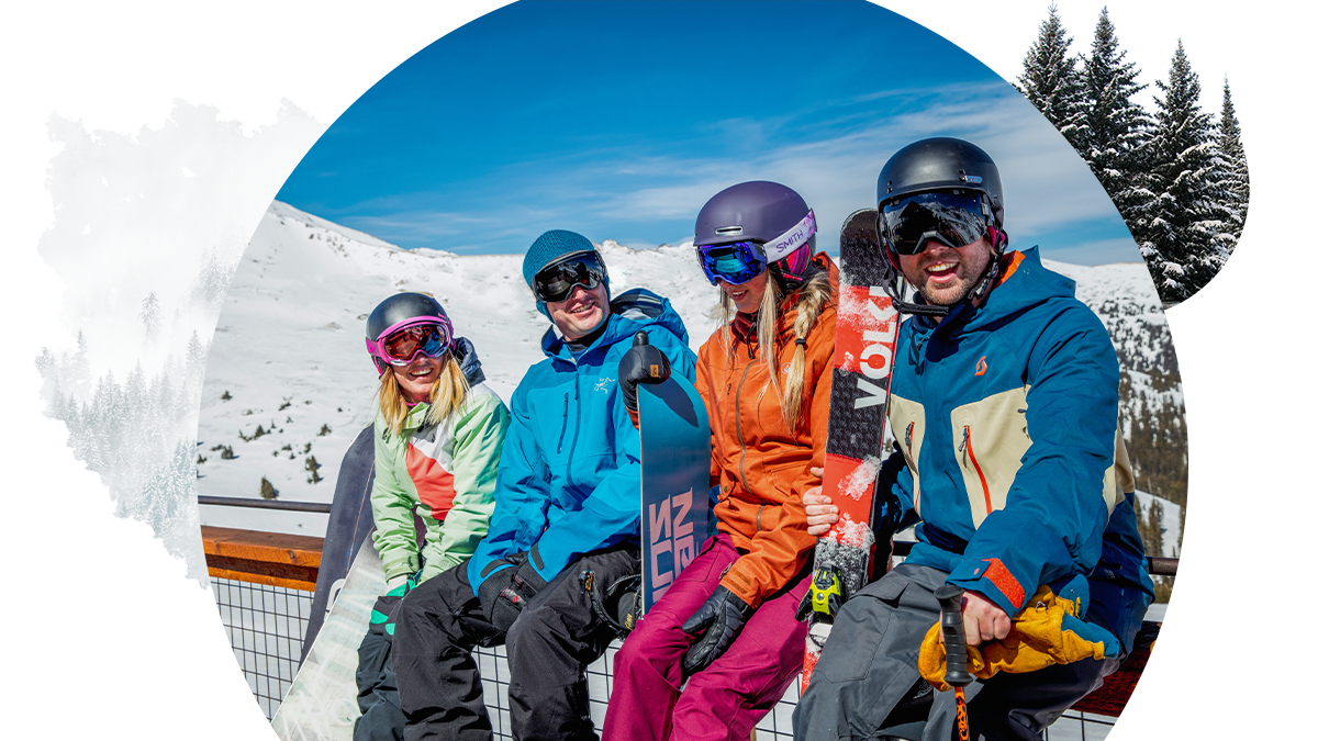 Group of skiers taking a break in the sun