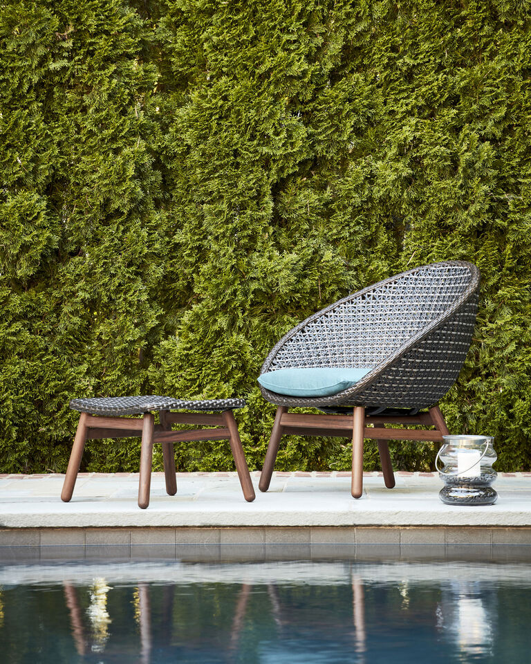 Nest by Jensen Outdoor poolside patio chair and ottoman with ipe wood base and viro-fiber woven tops
