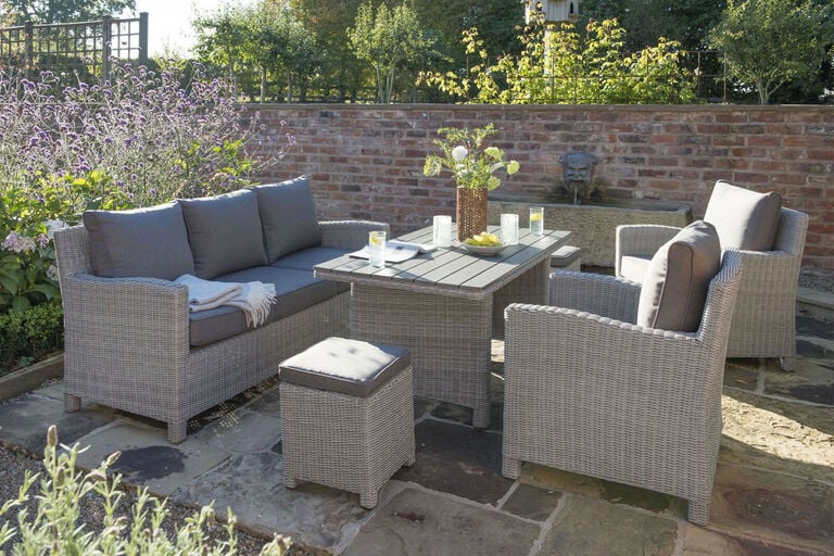 Palma & Cupido by Kettler gray woven lounge furniture on slate patio