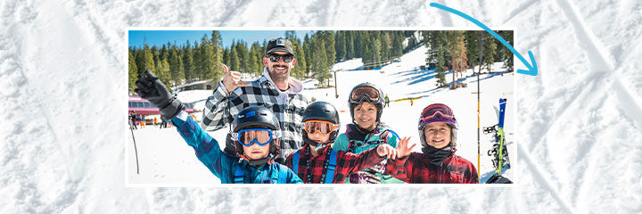 kids in ski gear on slopes smiling