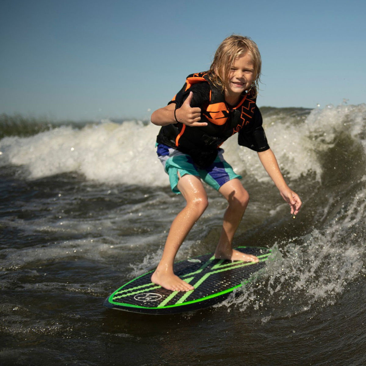 Kid on a surfboard
