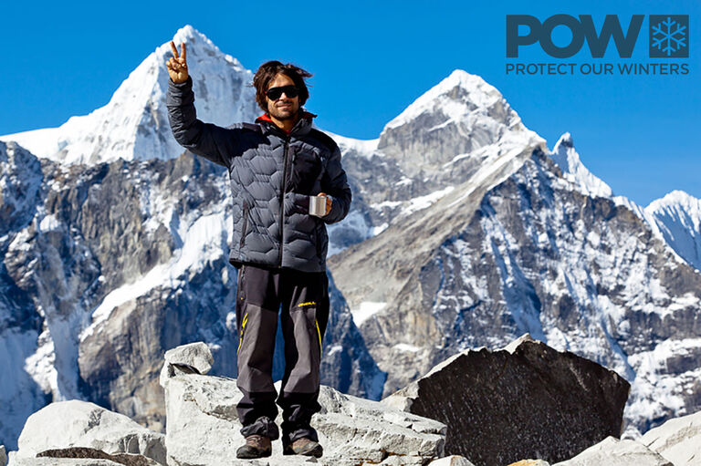 Jermey Jones standing on top of mountain for protect our winter