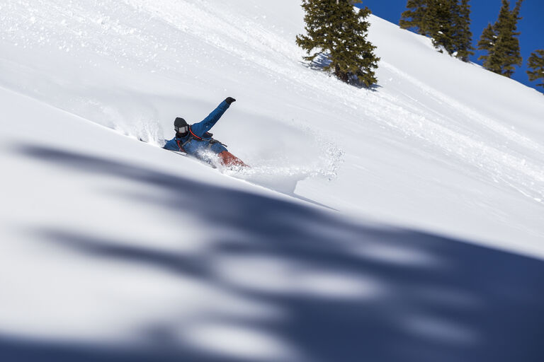 snowboarder in powder