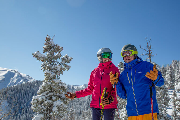 Man and woman enjoying beautiful bluebird day in Taos