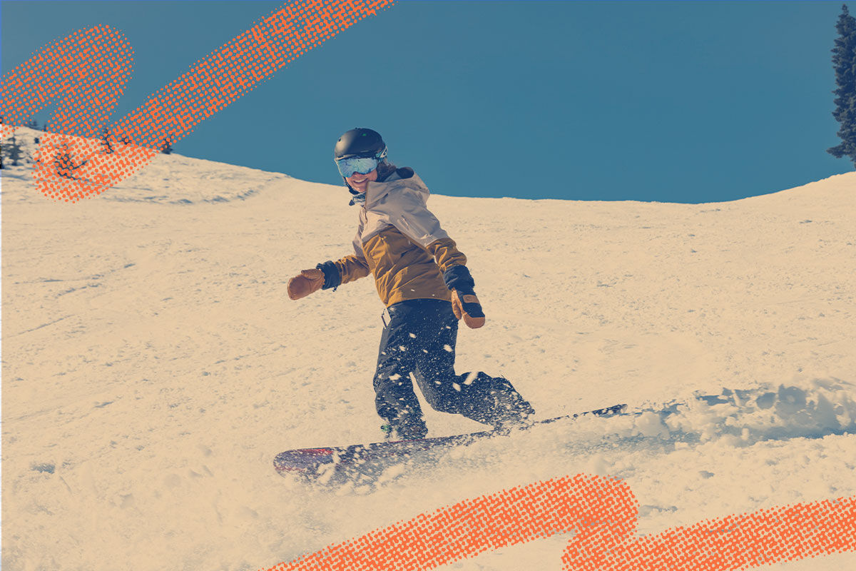 Snowboarder making toeside turn