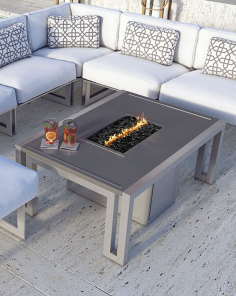 Rectangular gray fire pit with outdoor furniture