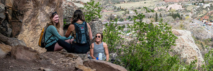Girls sitting on a hike Girls sitting on a hike