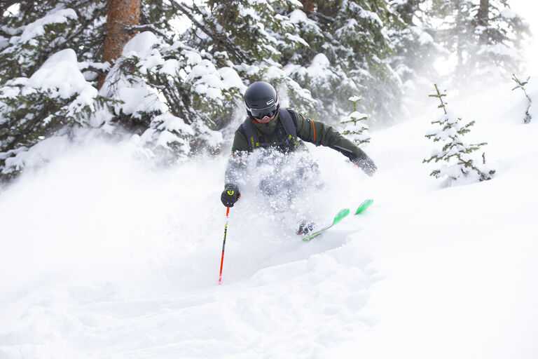 skier in deep pow