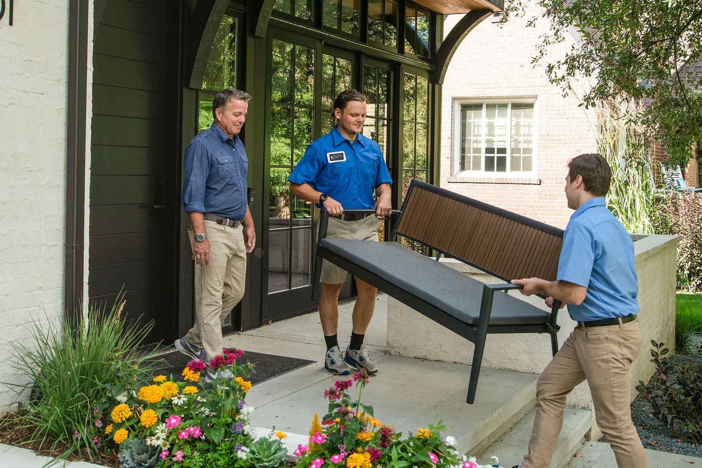 Christy Sports employees delivering outdoor furniture